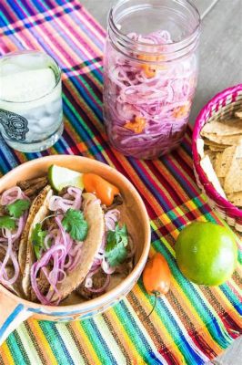  Cochinita Pibil: Wyśmienite mięso w otoczeniu aromatycznych przypraw i kremowej konsystencji